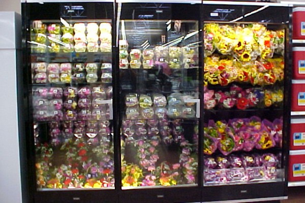 Lei and flower merchandise in 2 door combination floral display case