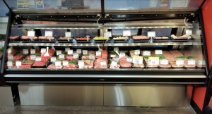 Meat case with DekFRESH technology designed to keep food fresher longer